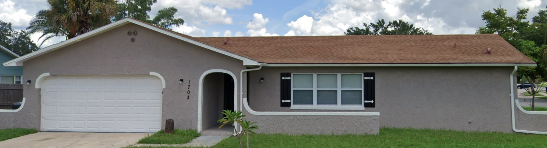 1703 Tahiti Pl Kissimmee, Florida Lisa T Integrity roof services customer with hail damage to roofing and new gutters