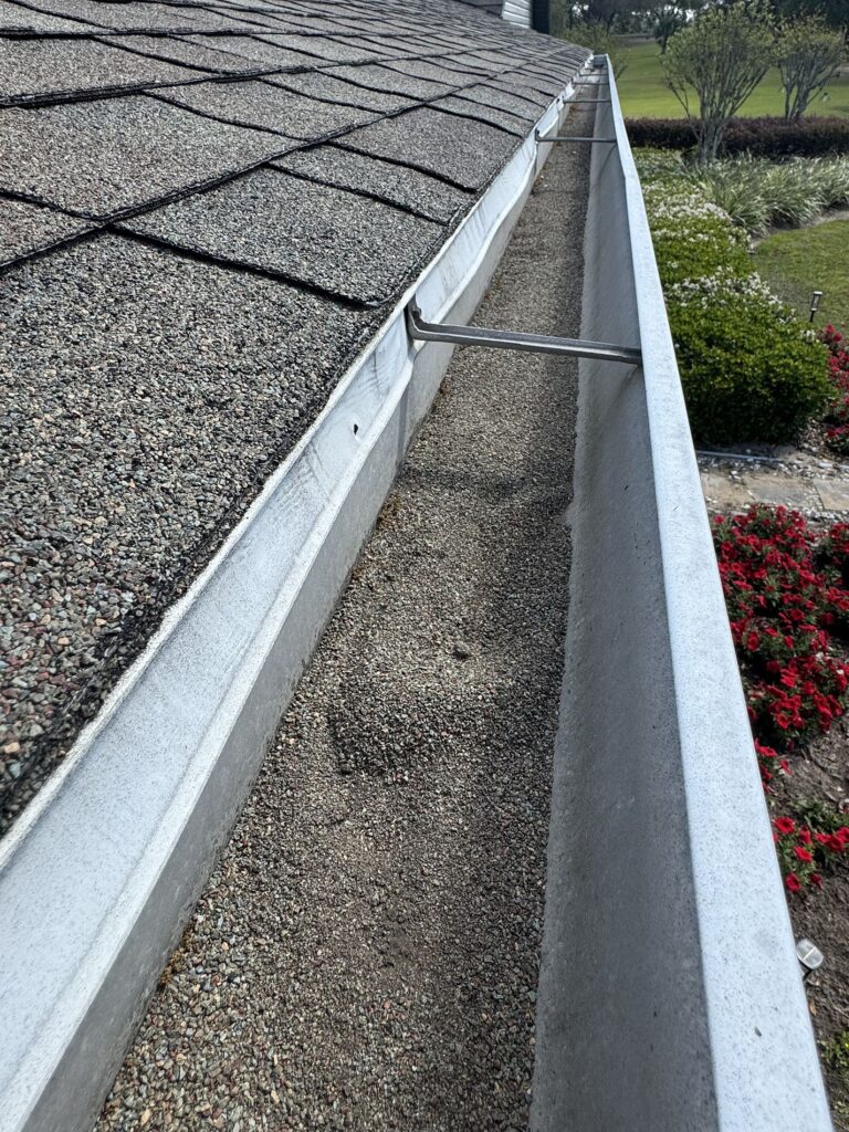 Gutters collecting shingle stone