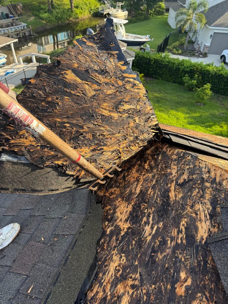 Removing old roofing and underlayment