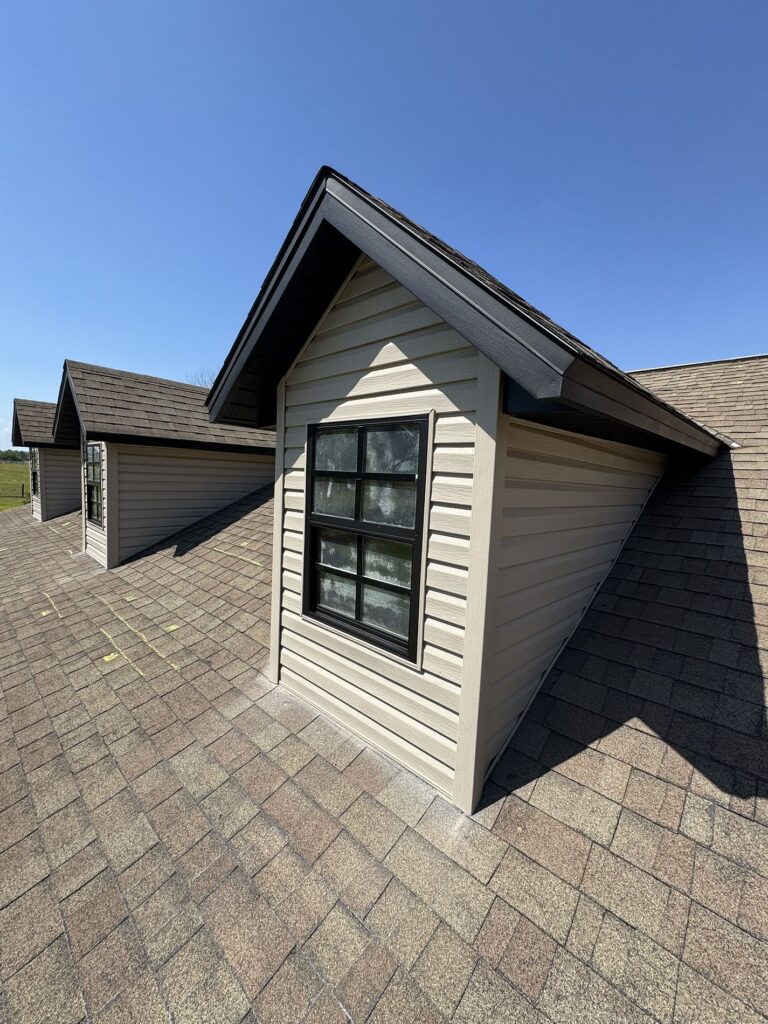Window roof shingles before Integrity Roof Servcies install