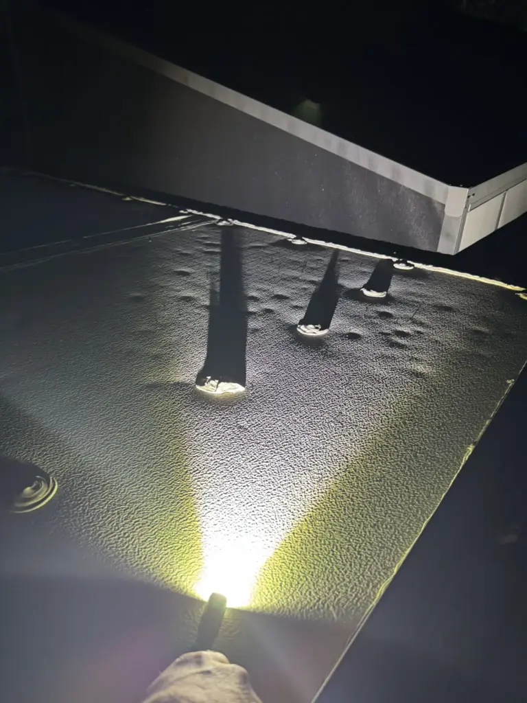 hail dents roof fasteners flashlight inspection 2