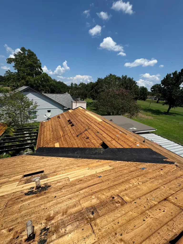 Integrity Roof Services Repair wood planks durning roof installation done right in winter park
