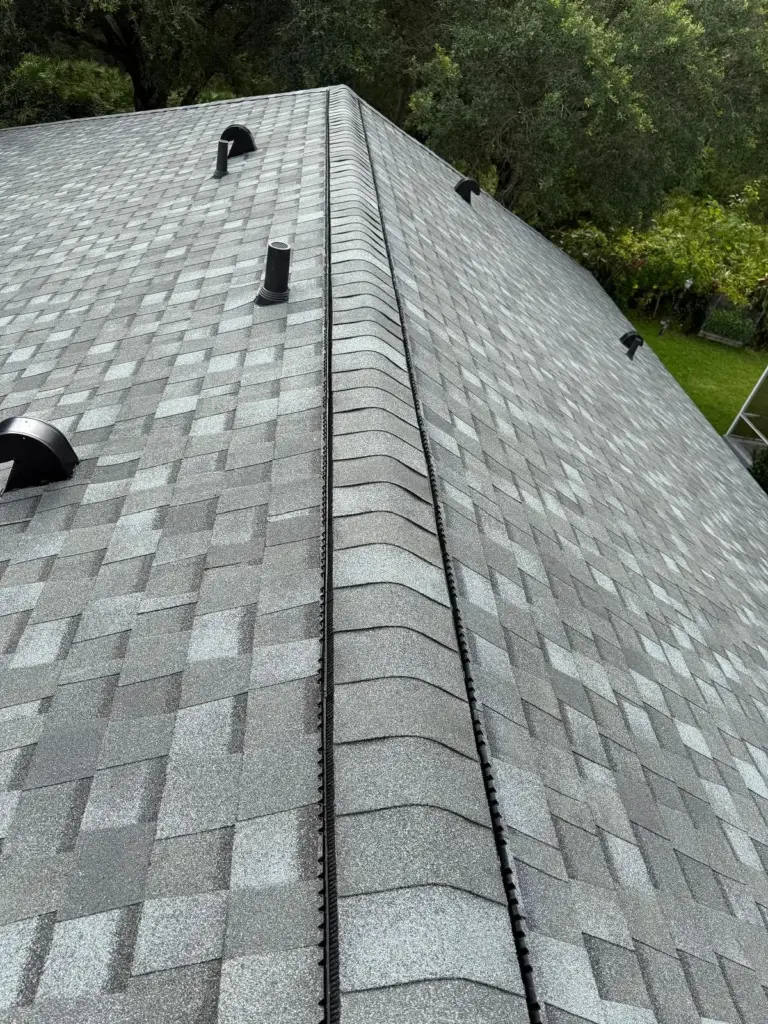 After roof photo showing attic vent installation with Atlas TruRidge ventilation system by Integrity Roof Services in Orlando, FL.