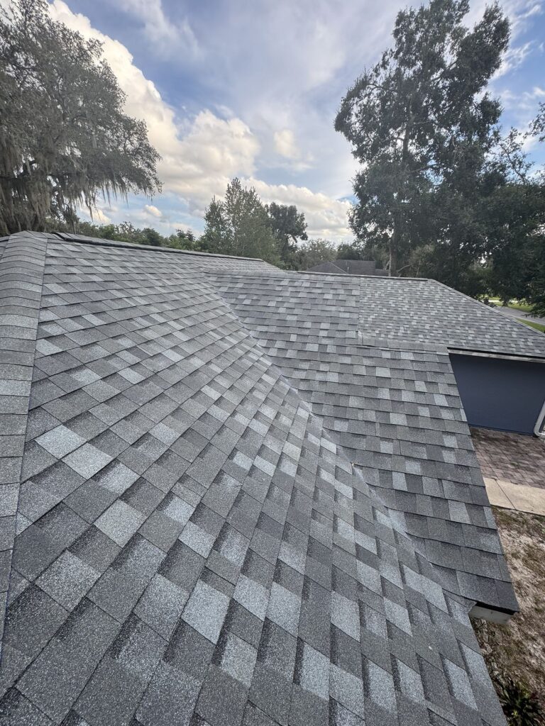 Atlas Pro Cut Hip and Ridge in Tan Mist enhances curb appeal — new roof installed in Longwood, Florida by Integrity Roof Services.”