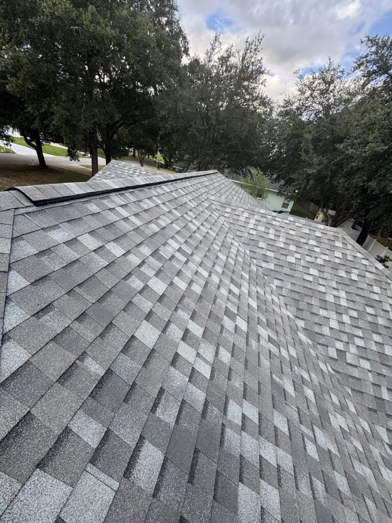 “Final roof inspection after Atlas Pristine Tan installation — completed project by Integrity Roof Services in Longwood, Florida.