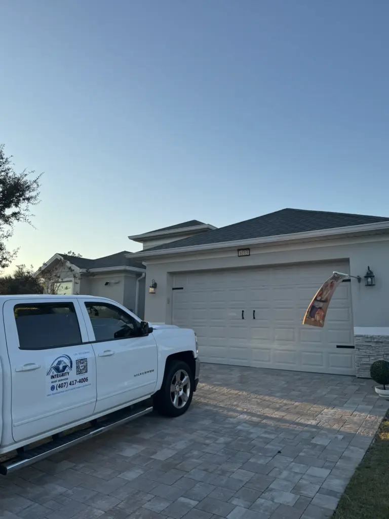 Freshly installed hip-and-ridge line in evening light