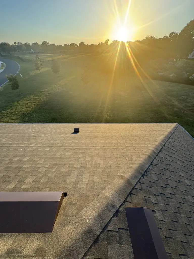 Sunset over newly installed Weathered Wood shingles