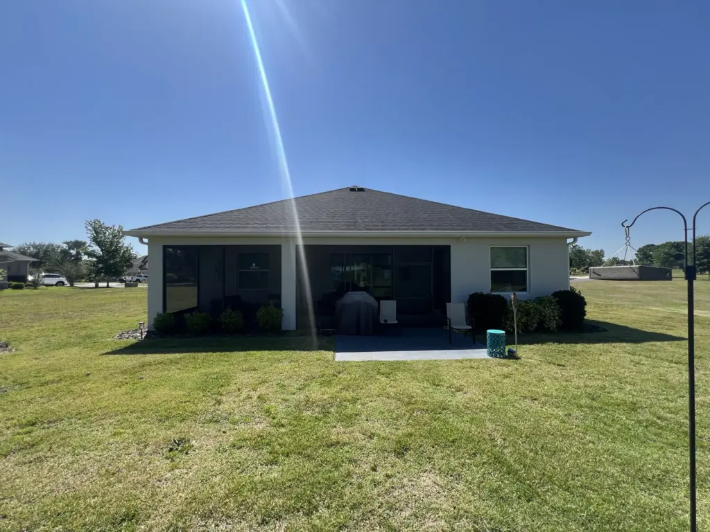 Roofing Projects FL 3 Garage with visible uniform shingle aging
