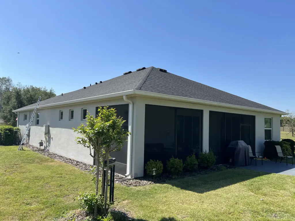 Roofing Projects FL 4 Garage roof showing storm wear and heat exposure