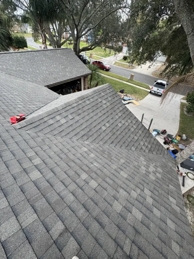 Clean rooflines and updated materials following leak-related roof replacement.