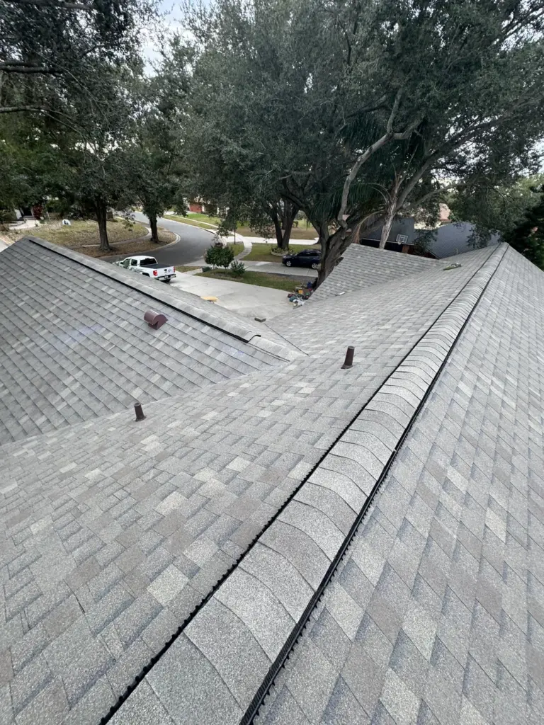 New hip and ridge installation completing the storm-ready roofing system.