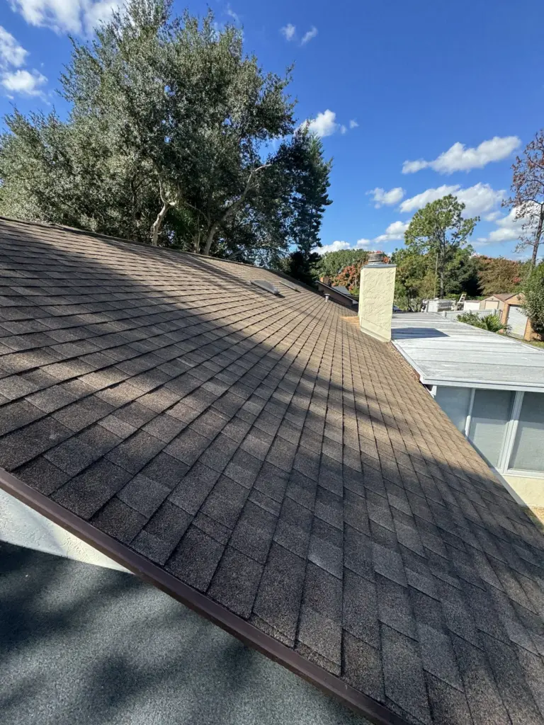 Roofing Projects FL 36 Leaky roof showing storm-damaged shingles and early signs of water intrusion on Orlando, FL home.