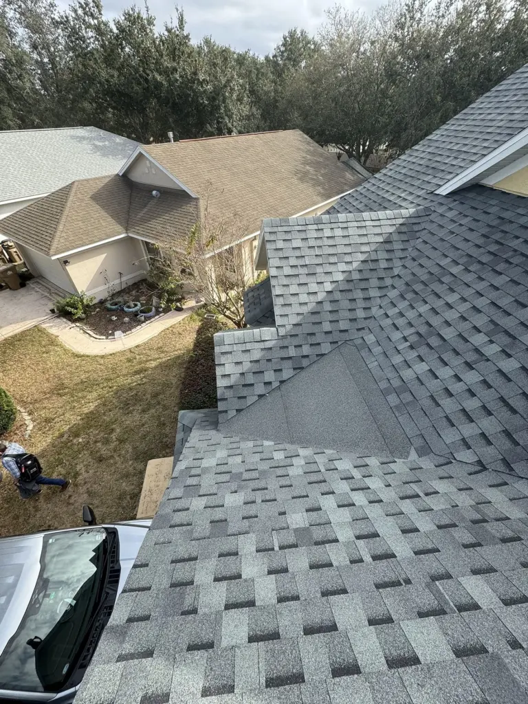 Finished roof plane with new shingles installed in Iron Gate neighborhood, Leesburg, Florida
