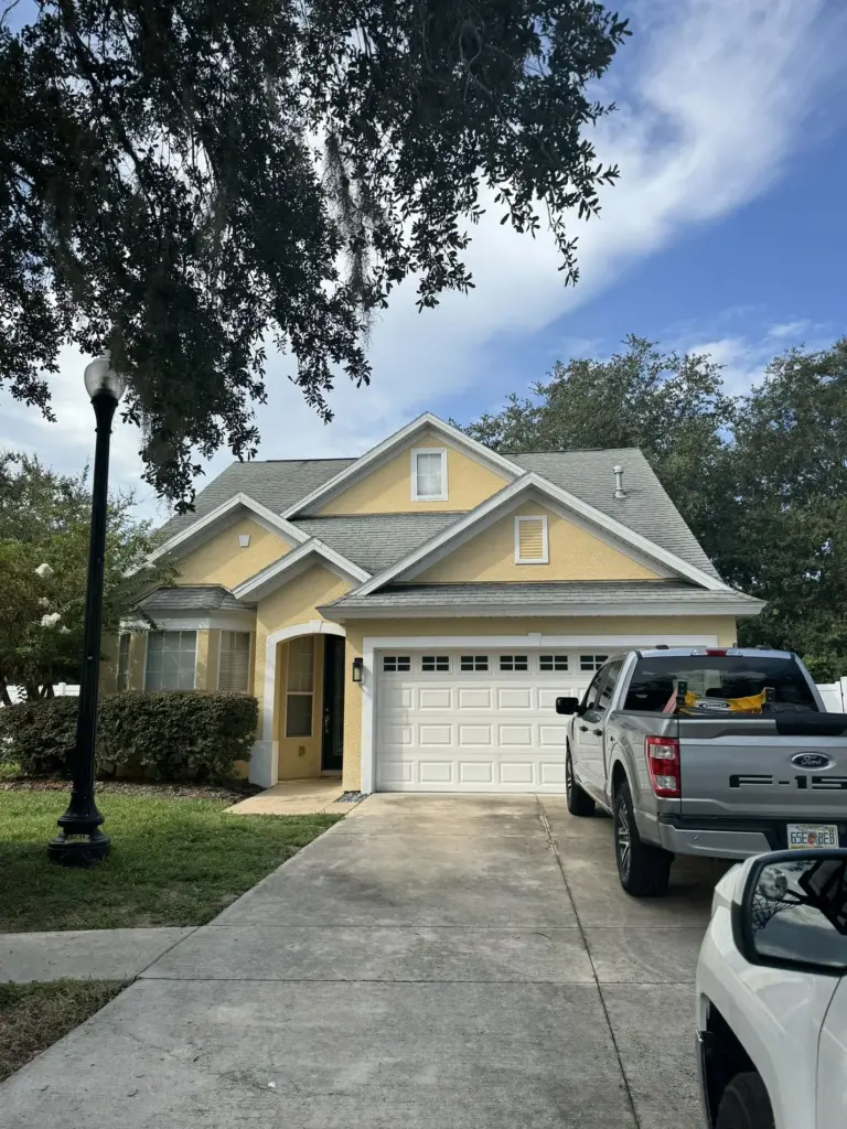 Roofing Projects FL 17 Storm-aged architectural asphalt shingles before roof replacement in Iron Gate neighborhood, Leesburg, Florida