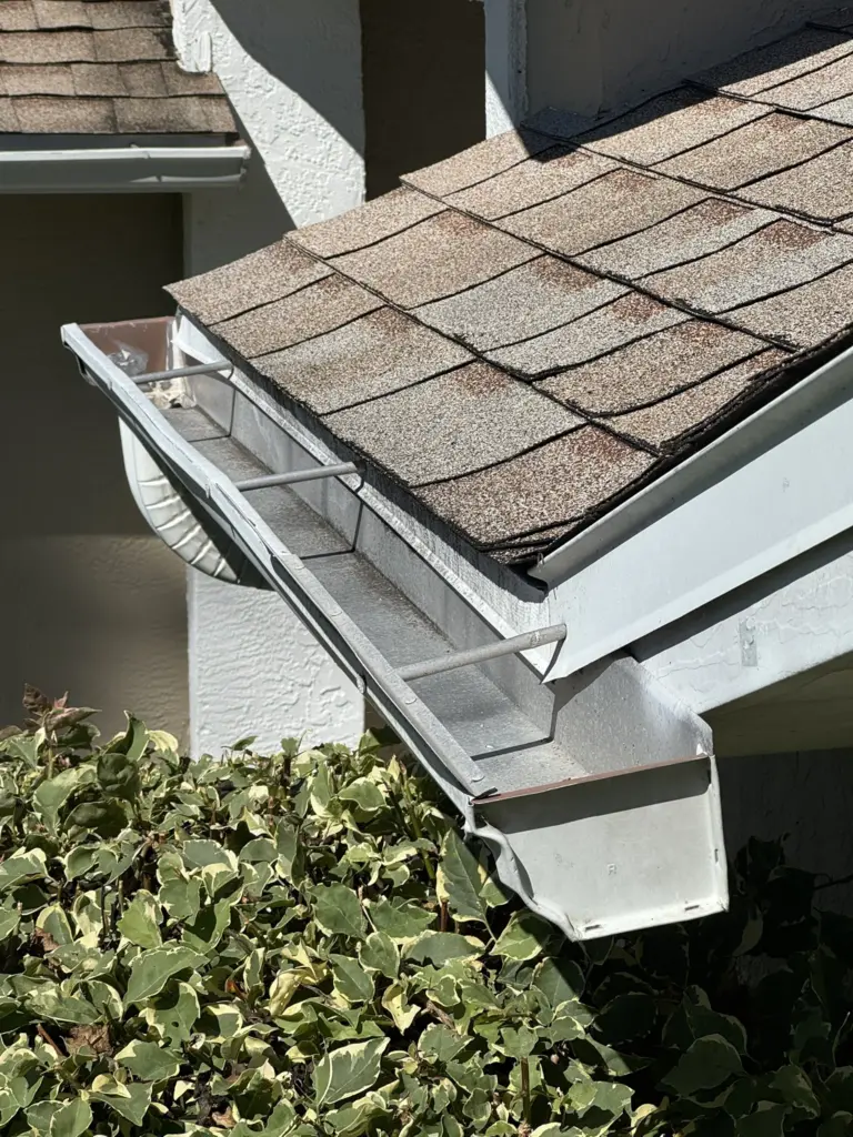 Roofing Projects FL 21 Aged and worn gutter system on a Port Orange Florida home before roof replacement