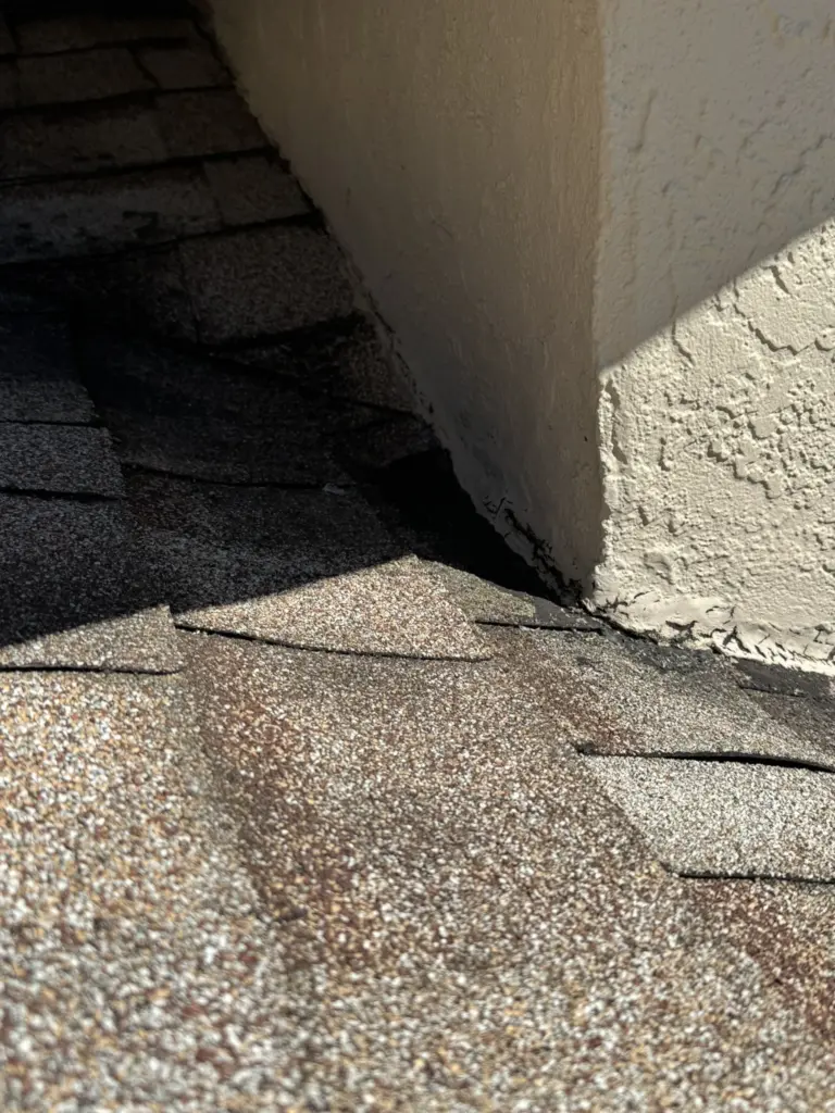 Roofing Projects FL 23 Aging asphalt roof shingles on a Port Orange FL home before replacement