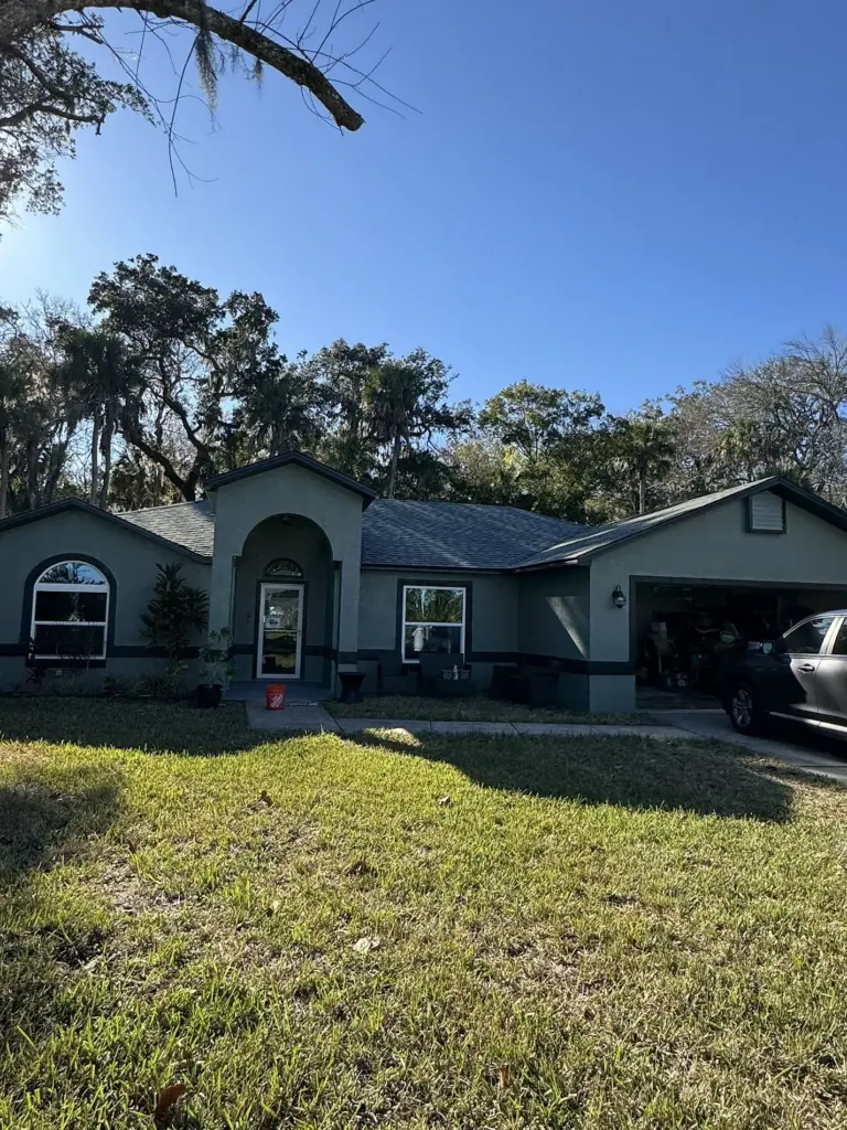 Newly installed architectural asphalt shingles on a residential roof in Port Orange, Florida