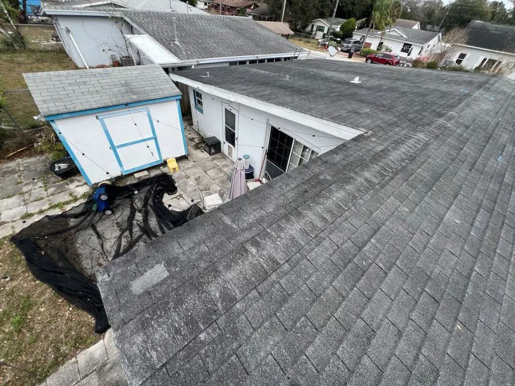 Old Shingle Roof Before Atlas Black Shadow Installation in Daytona Beach