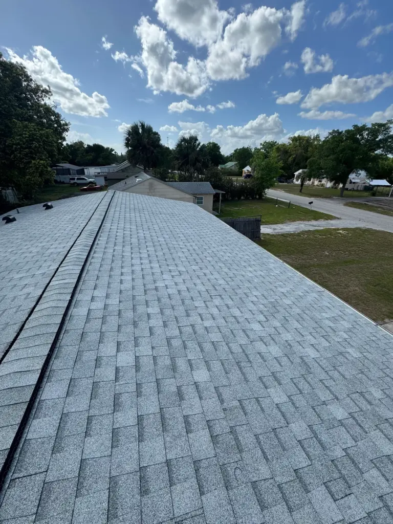 Finished residential roofing project on W Charlotte Ave using Atlas Oyster Shell shingles.