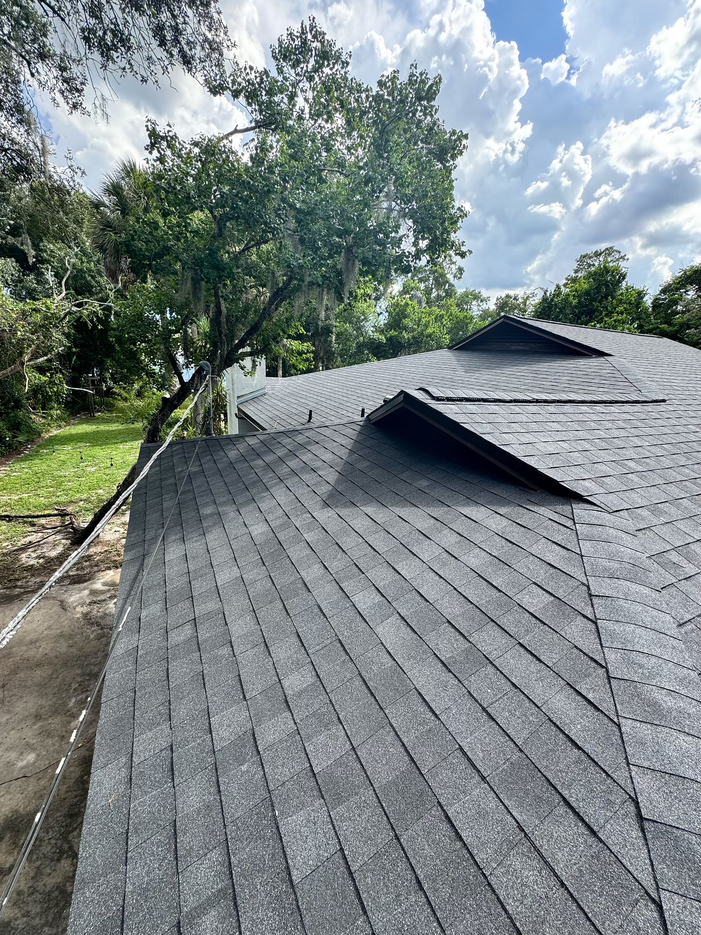 Roofing company in Fruitland Park, FL with Free Roofing inspections and best warranty 11 Completed Atlas Pinnacle Pristine Black Shadow roof replacement in Orlando FL by Integrity Roof Services