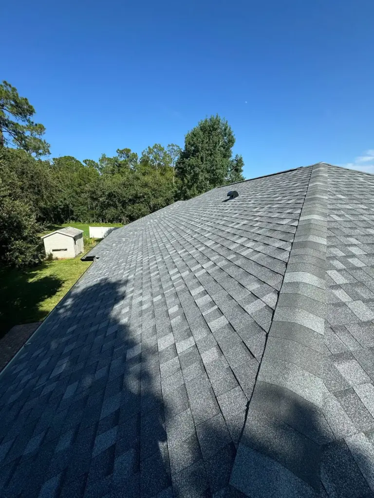 Completed Atlas Pinnacle Pristine Pewter shingles and ridge ventilation on Lancers Lane in Port Orange, FL.
