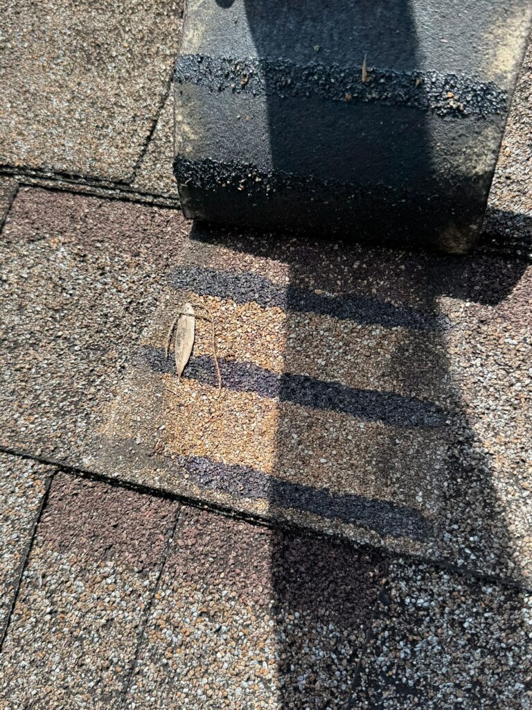Damaged roof shingles before replacement in Orlando FL