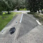 Aging roof in Leesburg, FL before replacement — showing worn shingles and visible granule loss before the Atlas Pinnacle Pristine Coastal Granite upgrade. Aging roof in Leesburg, FL before replacement — showing worn shingles and visible granule loss before the Atlas Pinnacle Pristine Coastal Granite upgrade.