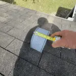 Attic venting before improvements — ridge area lacking proper airflow before Atlas TruRidge Vent installation. Attic venting before improvements — ridge area lacking proper airflow before Atlas TruRidge Vent installation.