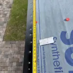 Aluminum drip edge installation along eaves — securing new metal edge flashing for long-term protection against water intrusion. Aluminum drip edge installation along eaves — securing new metal edge flashing for long-term protection against water intrusion.