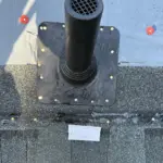 Bullet Boot® pipe flashings installed and sealed — replacing old cracked boots to create watertight seals around vent pipes. Bullet Boot® pipe flashings installed and sealed — replacing old cracked boots to create watertight seals around vent pipes.