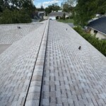 Before photo of the aging roof prior to replacement — worn shingles and vent leaks later resolved by Integrity Roof Services in Longwood, FL. Before photo of the aging roof prior to replacement — worn shingles and vent leaks later resolved by Integrity Roof Services in Longwood, FL.
