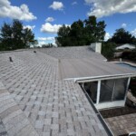 The Integrity crew removing old materials during tear-off — prepping for proper underlayment and new Atlas Pinnacle® Pristine Tan installation. The Integrity crew removing old materials during tear-off — prepping for proper underlayment and new Atlas Pinnacle® Pristine Tan installation.