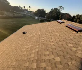 ompleted Atlas Pinnacle Pristine Weathered Wood roof installation showing uniform shingle alignment and a clean finished surface in Mount Dora, FL Clean finished roof with Weathered Wood shingles