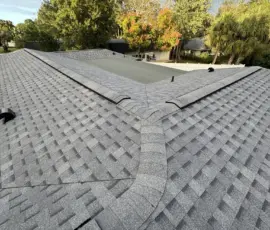 Close-up of newly installed Atlas Pristine Pewter shingles showing clean lines and premium finish — Winter Park FL. Close-up of newly installed Atlas Pristine Pewter shingles showing clean lines and premium finish — Winter Park FL.