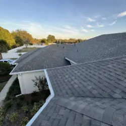 Full roof surface completed with new architectural shingles. Completed roof replacement showing full shingle coverage in Iron Gate Leesburg FL