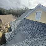 On-site documentation image following completion of a residential roofing project in Iron Gate. Integrity Roof Services team member on-site after roof installation in Iron Gate, Leesburg, FL