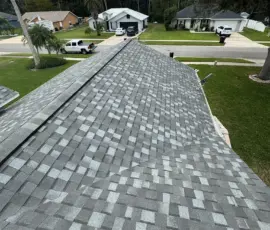 Completed Roof Installation Showing Full Coverage Completed roof installation showing full shingle coverage in Port Orange Florida