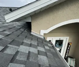 New shingle system installed with uniform spacing. Properly aligned architectural shingles after roof installation in Port Orange FL