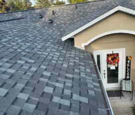 Front elevation view of completed roof replacement. Front elevation of completed roof installation in Port Orange Florida