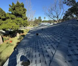 After close-up showing finished roof edge detailing on the completed system. Roof edge and shingle termination detail after installation in Port Orange, Florida