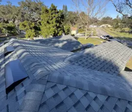 After detail showing the finished valley area on the completed roofing system. Roof valley area after shingle installation on a completed roof in Port Orange, Florida