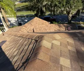 After photo showing the completed roof surface following replacement. Finished roof planes with new shingle installation in Sanford, Florida