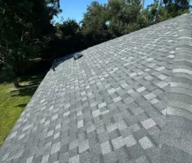 Completed Atlas Pinnacle Pristine Pewter roof replacement on Lancers Lane in Port Orange, Florida. Completed Atlas Pinnacle Pristine Pewter roof with Integrity Roof Services sign in the Vineyards neighborhood of Port Orange, FL.
